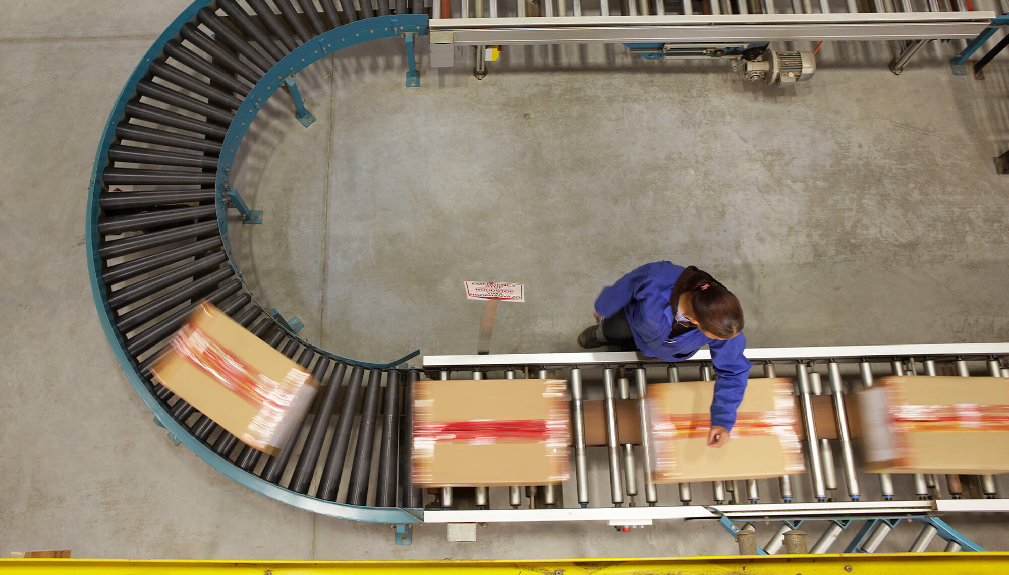 a supply chain with one person standing working