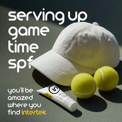 White baseball cap, sunscreen tube, and two tennis balls on a court with the phrase "serving up game time SPF" and Intertek branding.